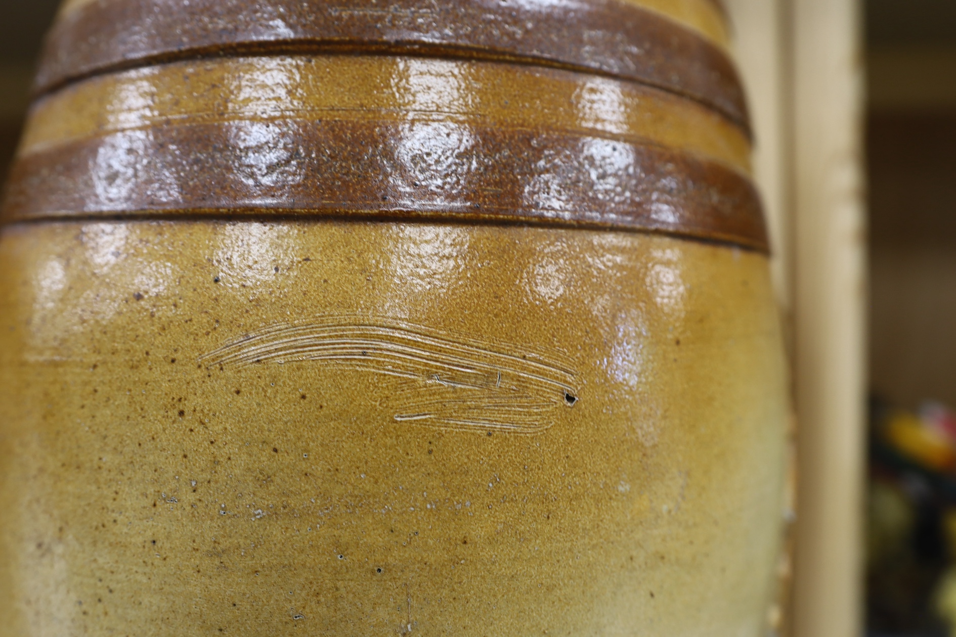 A Doulton and Watts stoneware spirit barrel, applied with the Royal coat of arms, 33.5cm high. Condition - some scratches in the glazing and marks on band by tap aperture